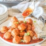 A serving of Crockpot Sweet Chili Meatballs on a white plate with rice on the side and extra sauce being spooned over the top. The text reads, “Crockpot Sweet Chili Meatballs”