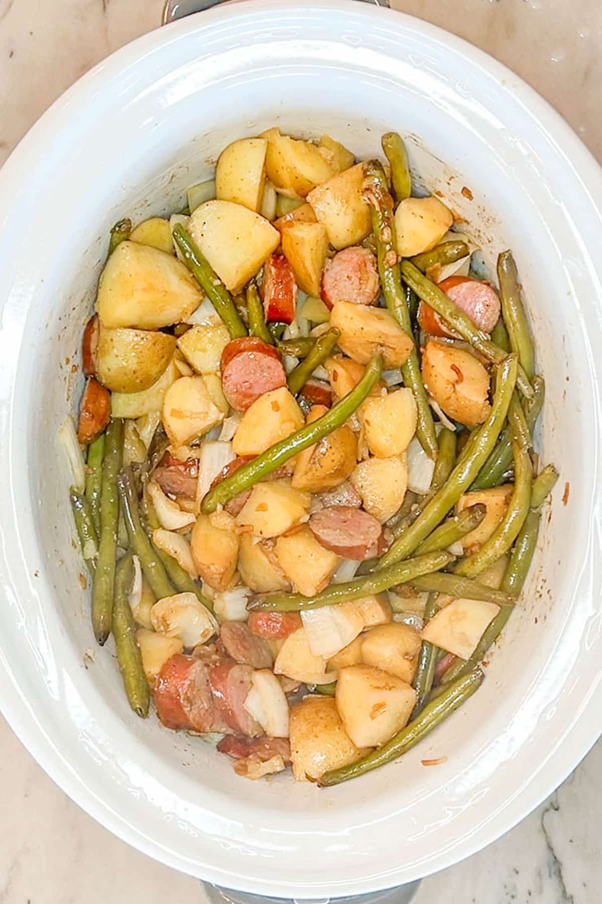 Step 4 for Crockpot Sausage and Potatoes - cook until potatoes are tender and sausage is warmed through