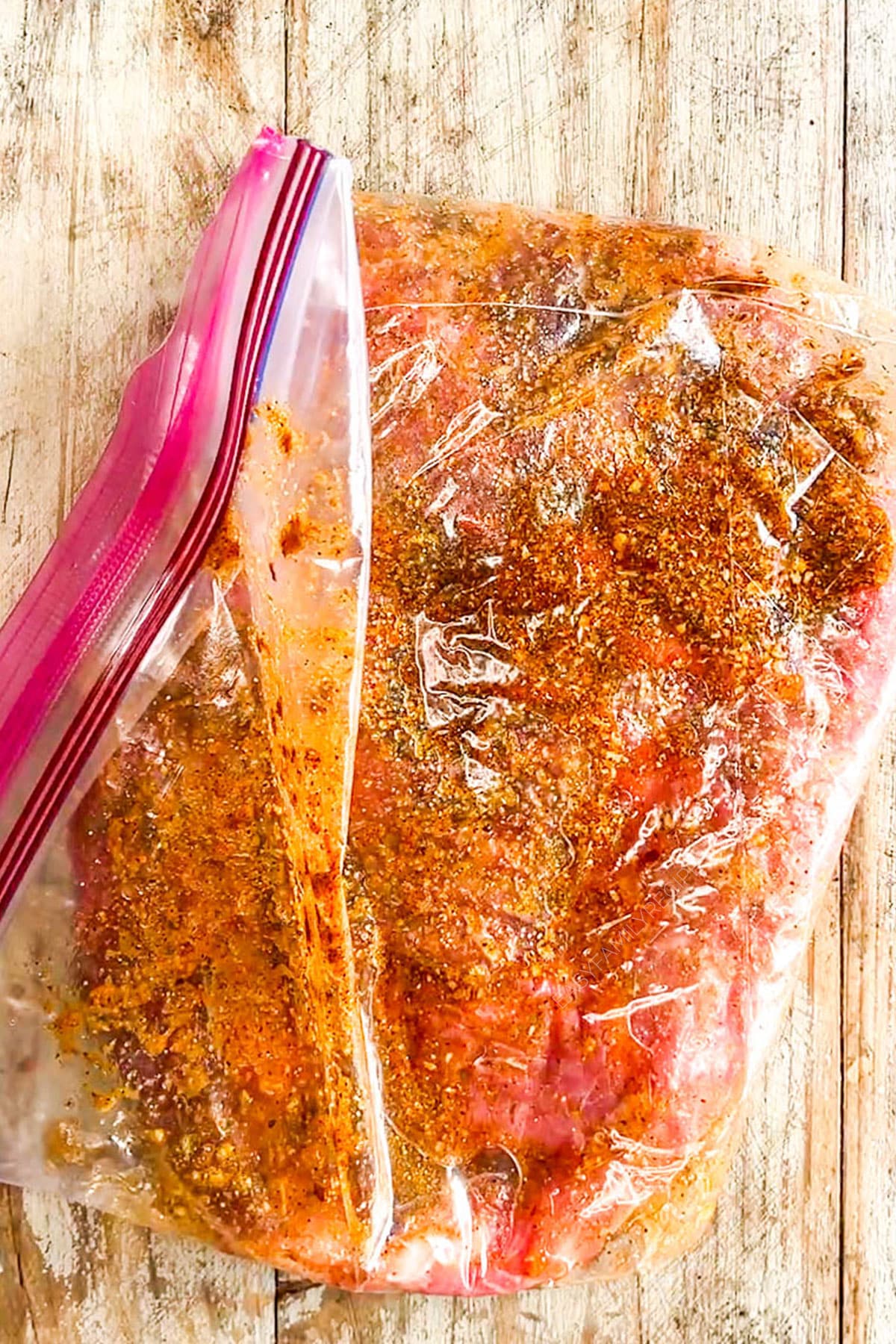 Step 2 of how to make sheet pan steak fajitas: Marinate the steak