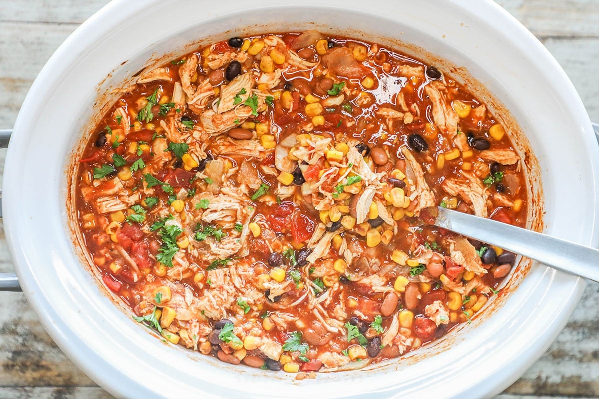 Crockpot Chicken Taco Soup in a white slow cooker crock