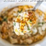 A large spoon scoops out a serving of Crockpot Mexican Street Corn Chicken. The text reads, “Crockpot Mexican Street Corn Chicken”