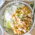 Crockpot Mexican Street Corn Chicken top view of a bowl with rice and fresh lime wedges. The text reads, “Crockpot Mexican Street Corn Chicken”