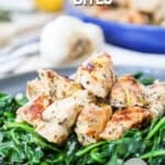greek chicken bites over spinach
