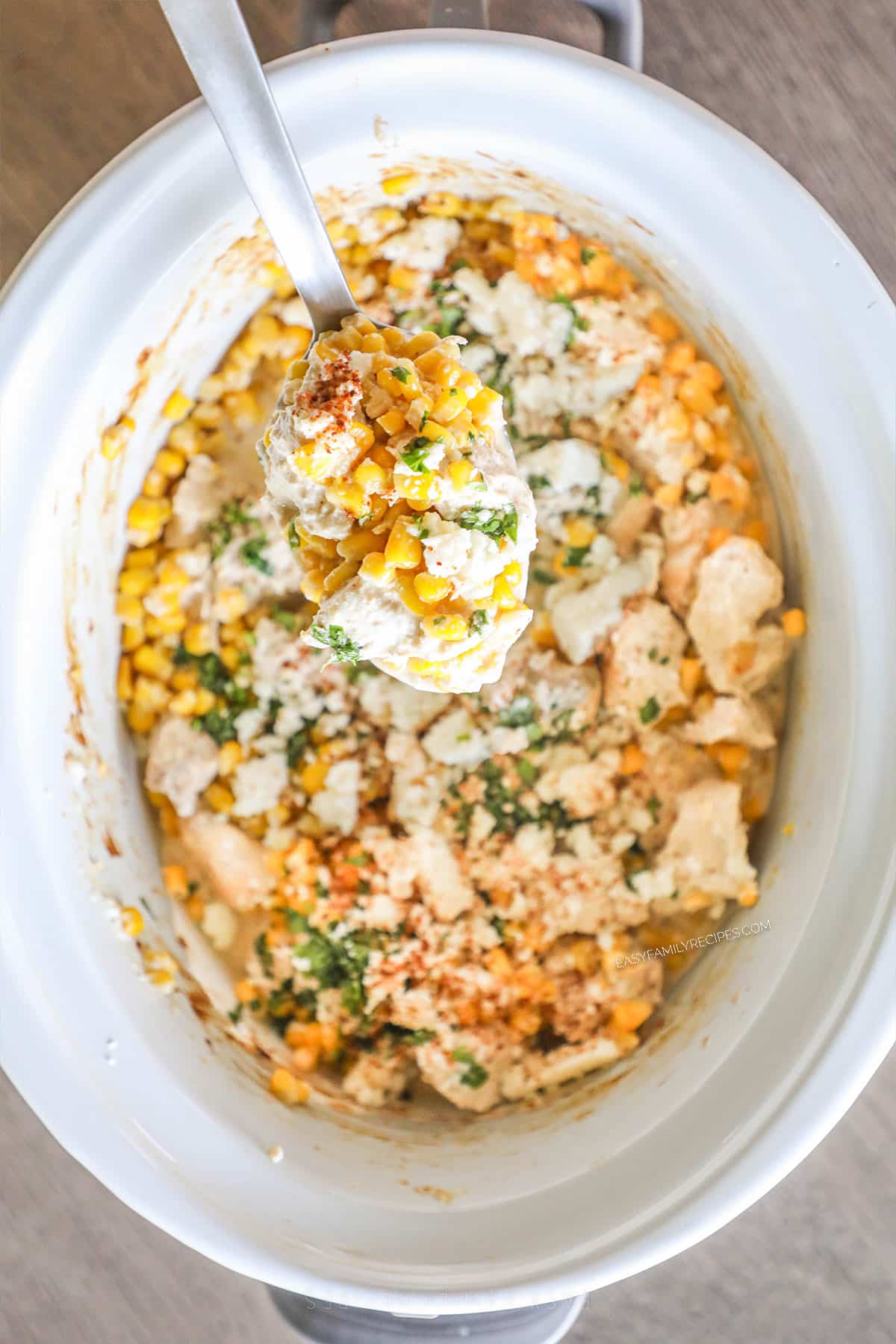 Step 4 for how to make Crockpot Mexican Street Corn Chicken: Stir and serve