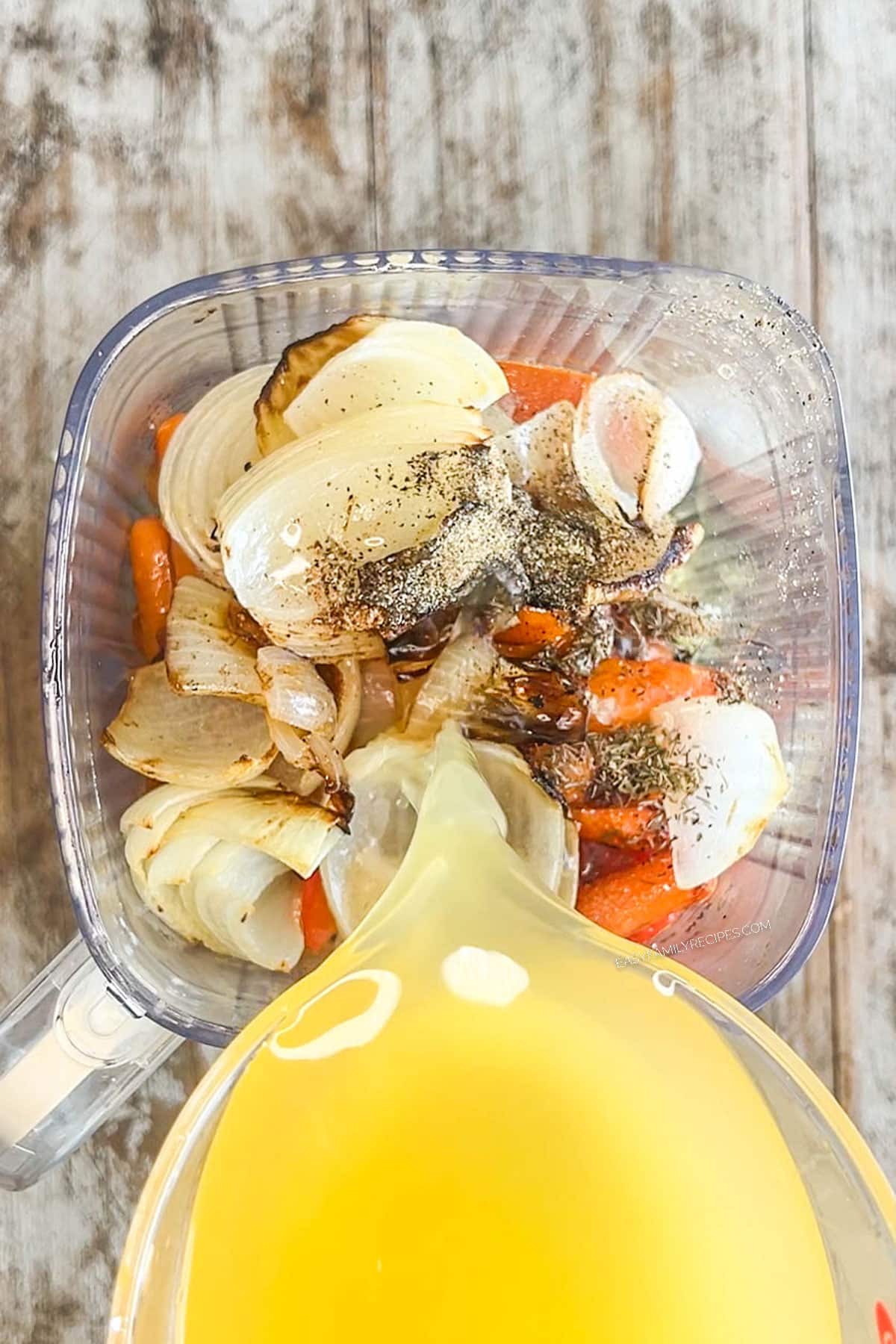 Step 4 for how to make Roasted Veggie Soup: Pour in broth
