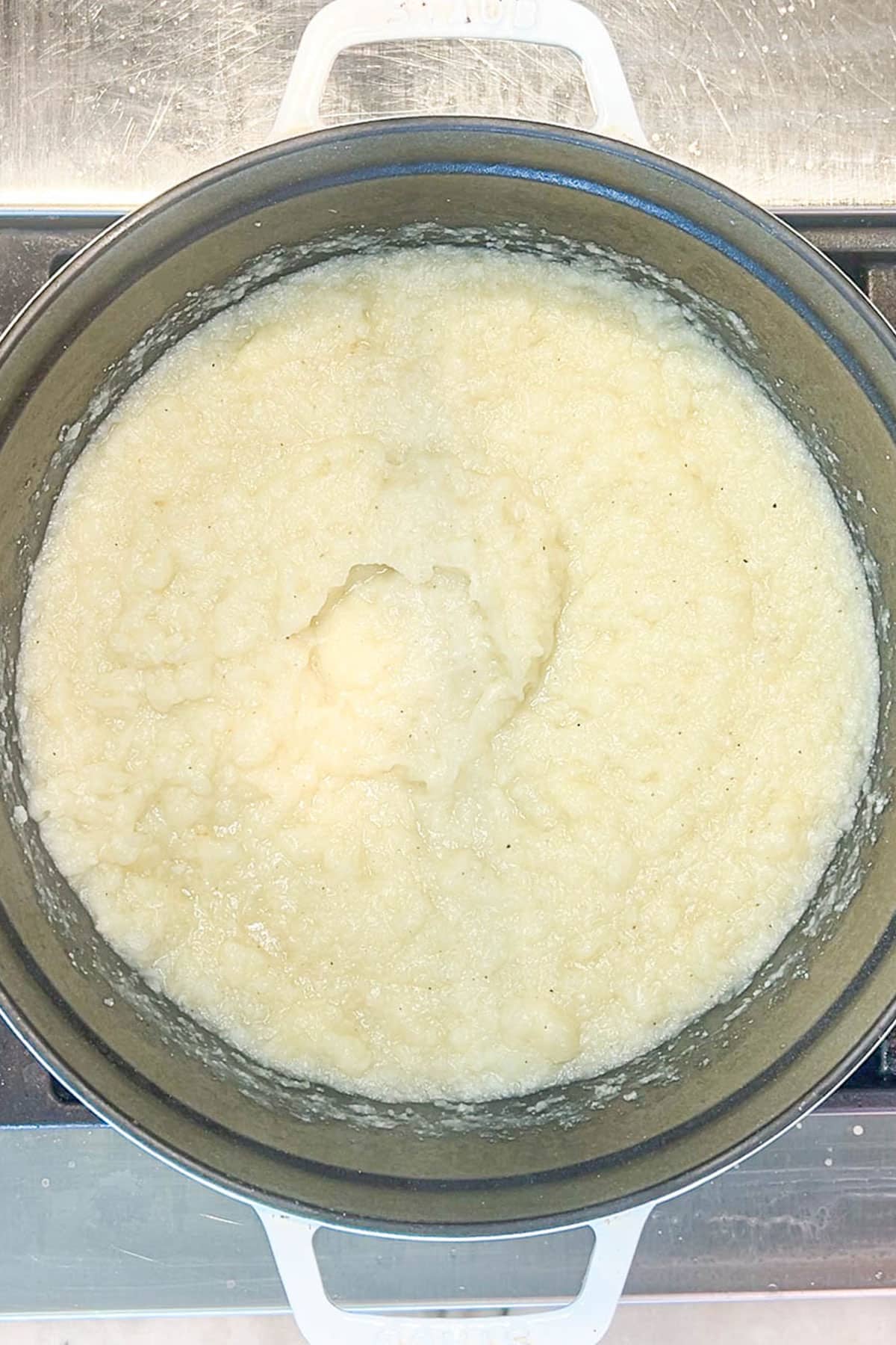 Cauliflower in a pot after being blended.