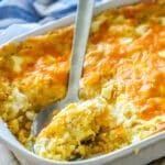 Spoonful of light fluffy corn pudding.