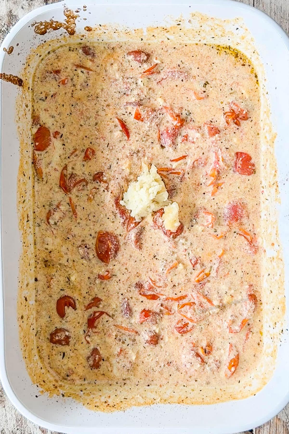 baked ricotta and roasted tomatoes stirred together to make a sauce.