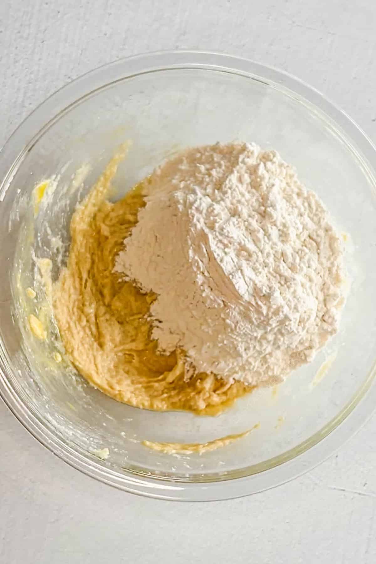 dry and wet ingredients in a mixing bowl.