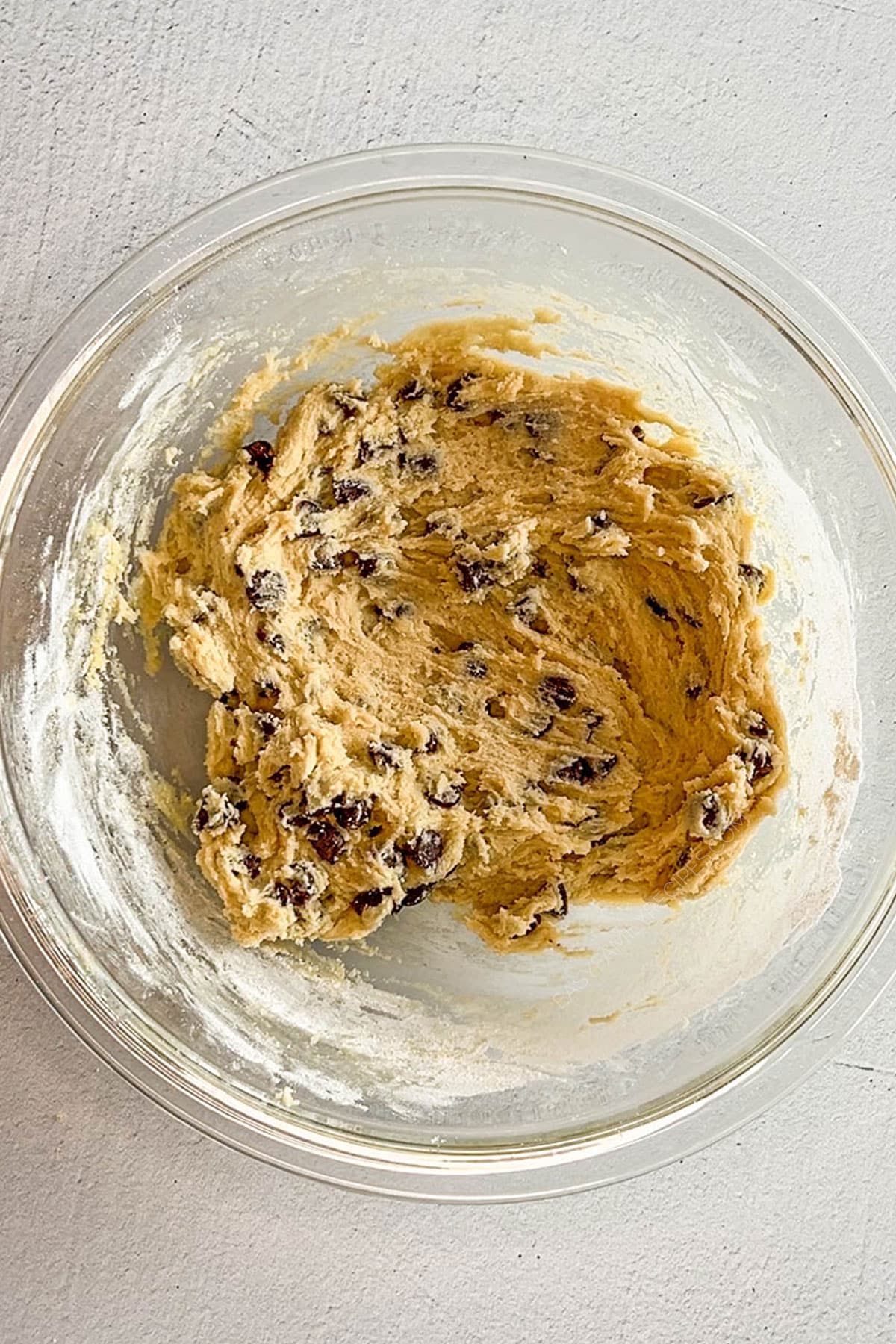 chocolate chip cookie dough in a mixing bowl.