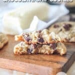 two halves of a chocolate chip cookie stacked.