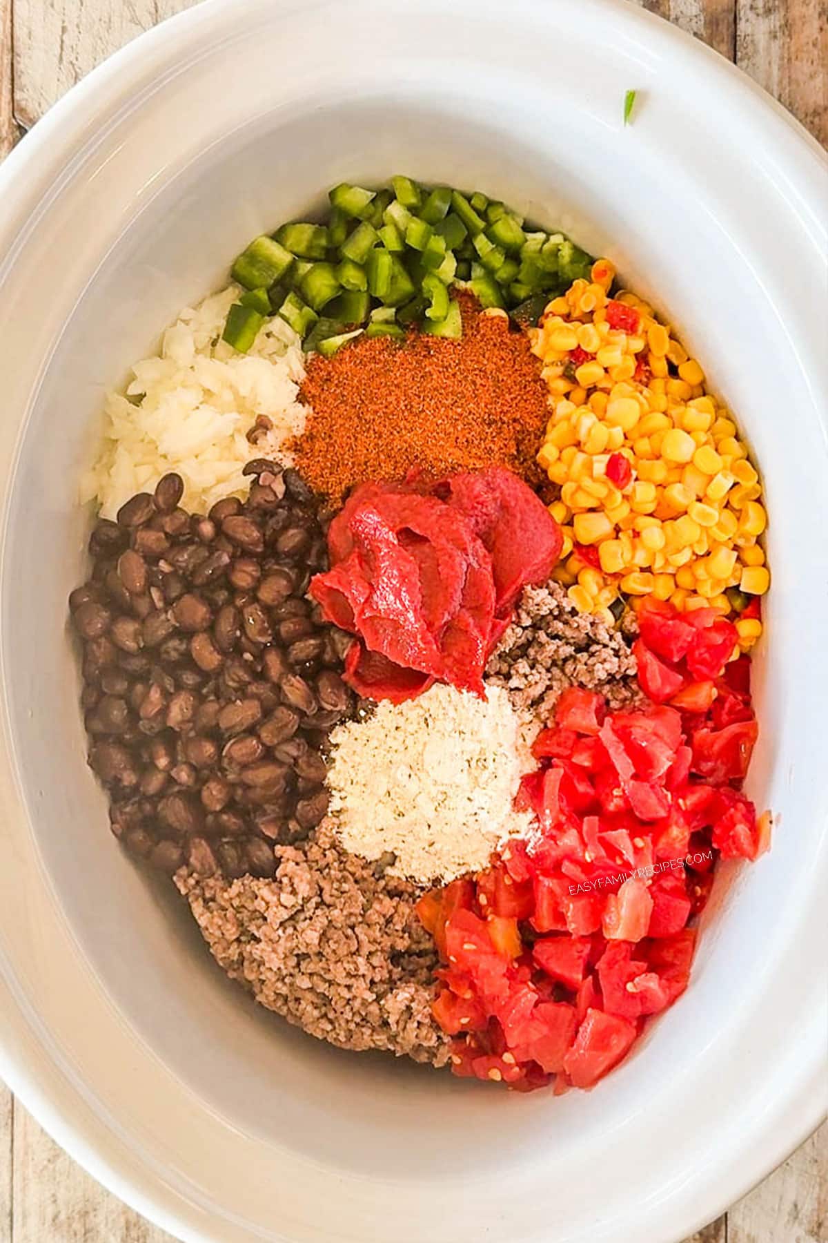 How to make Crockpot Taco Soup Step 2: Add corn, black beans, Rotel tomatoes, tomato paste, taco & ranch seasonings