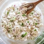 above image of a turkey salad in a mixing bowl.