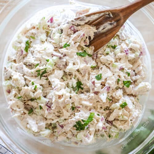 above image of a turkey salad in a mixing bowl.