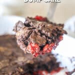 a large scoop of black forest chocolate cherry cake held above a baking dish.