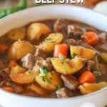Slow cooker beef stew in a white borl