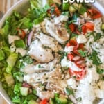 Close up of plated chicken gyro bowl in a white bowl