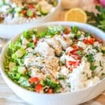 2 Chicken Gyro Bowl with toppings in white bowls