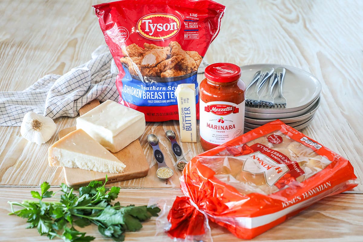 Ingredients for parmesan chicken sliders - hawaiian rolls, chicken, lettuce, seasonings, parmesan cheese, mozzarella cheese