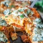 Sheet Pan Lasagna lifted out of pan by metal spatula