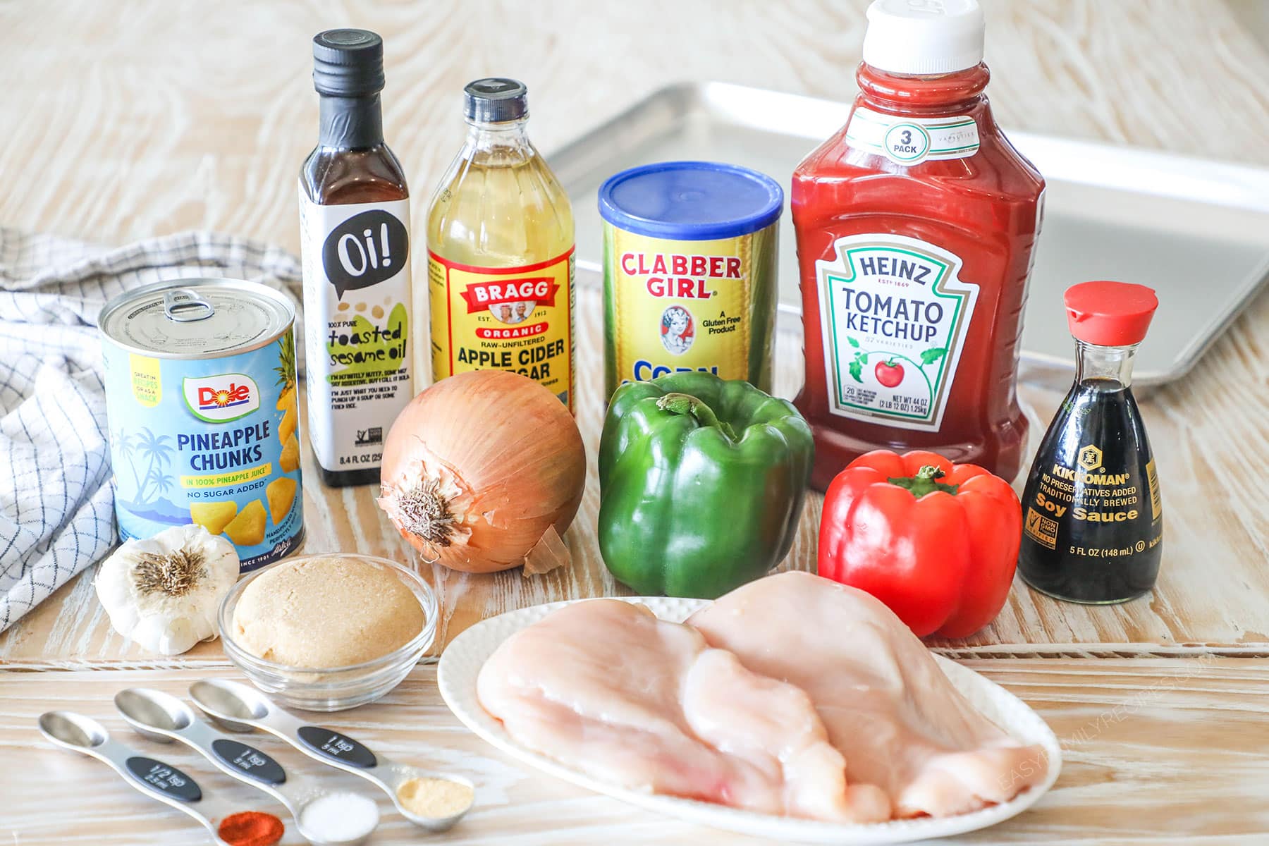 Ingredients needed to make easy sheet pan sweet and sour chicken.