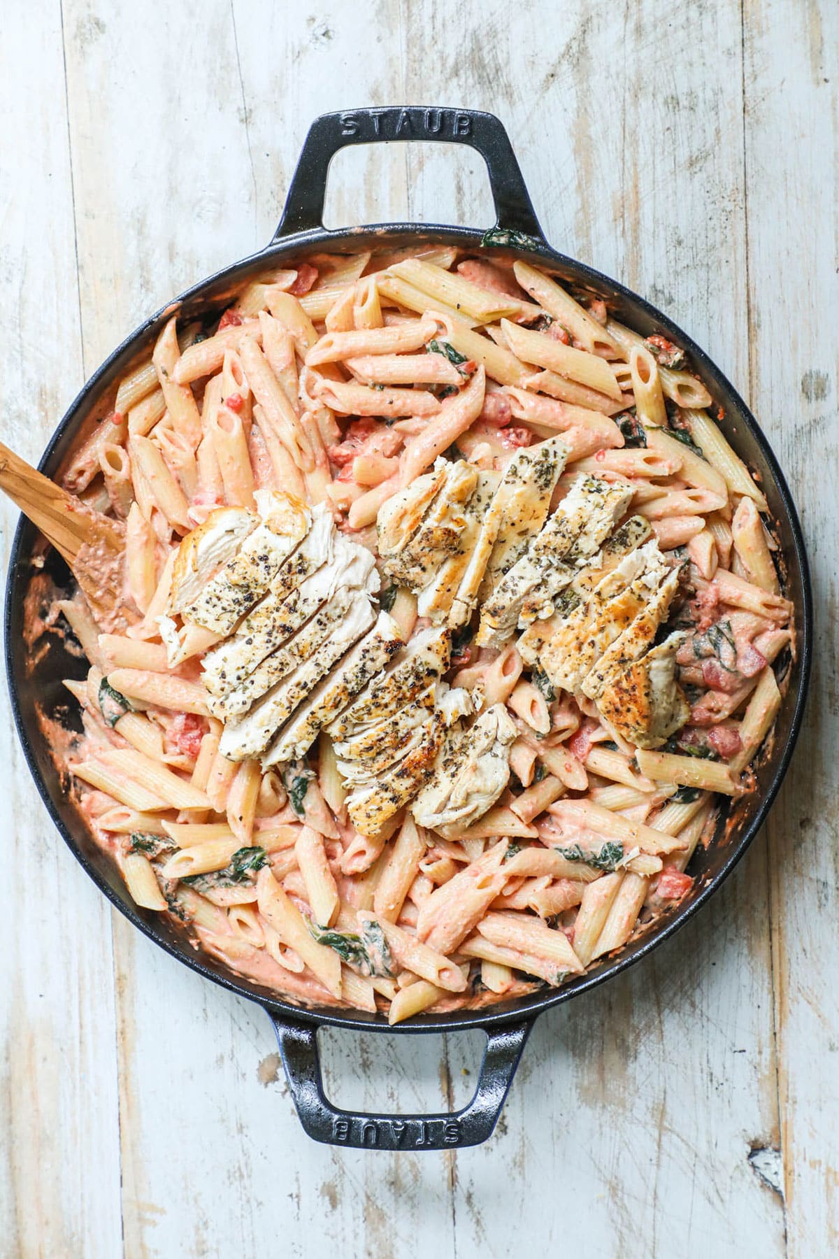 How to make Creamy Italian Chicken Pasta Step 4: add cooked chicken to pasta and creamy sauce