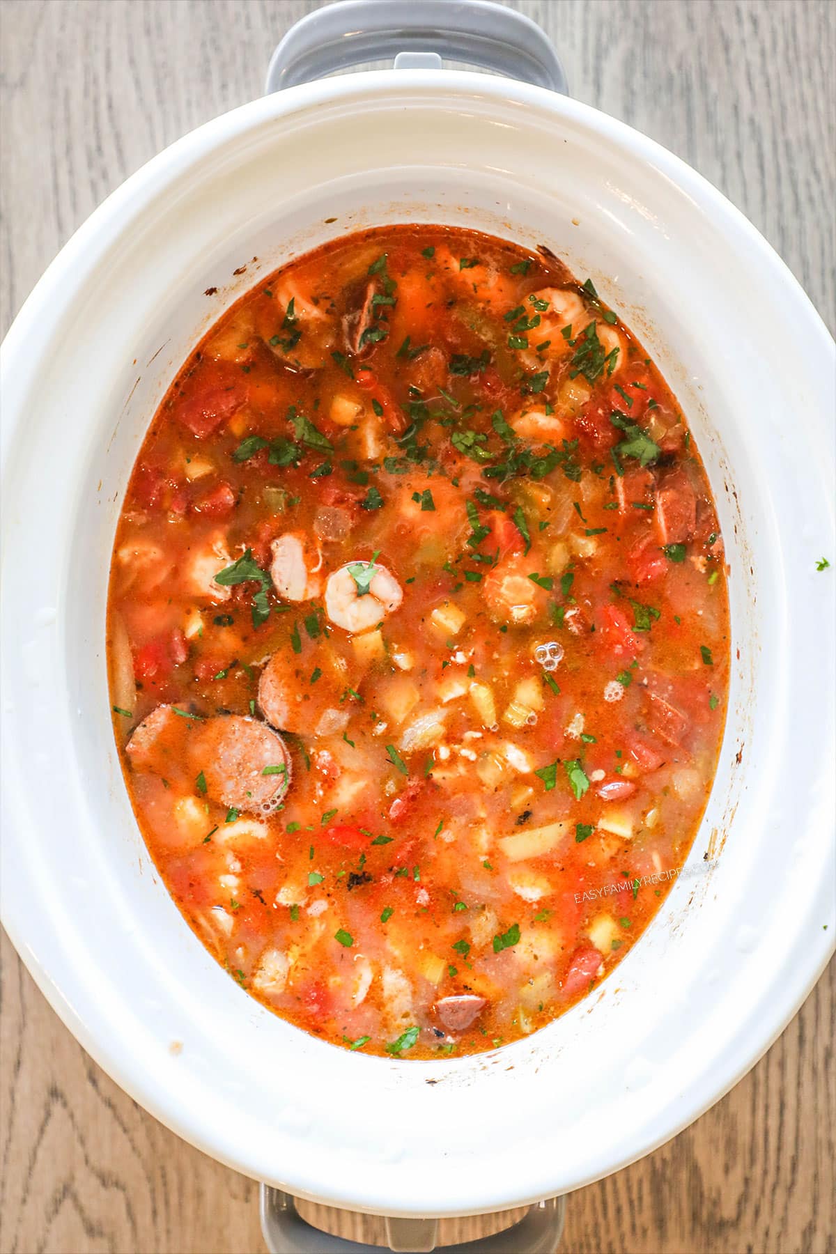 White crock pot with jambalaya