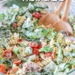 a large bowl filled with ranch pasta salad.