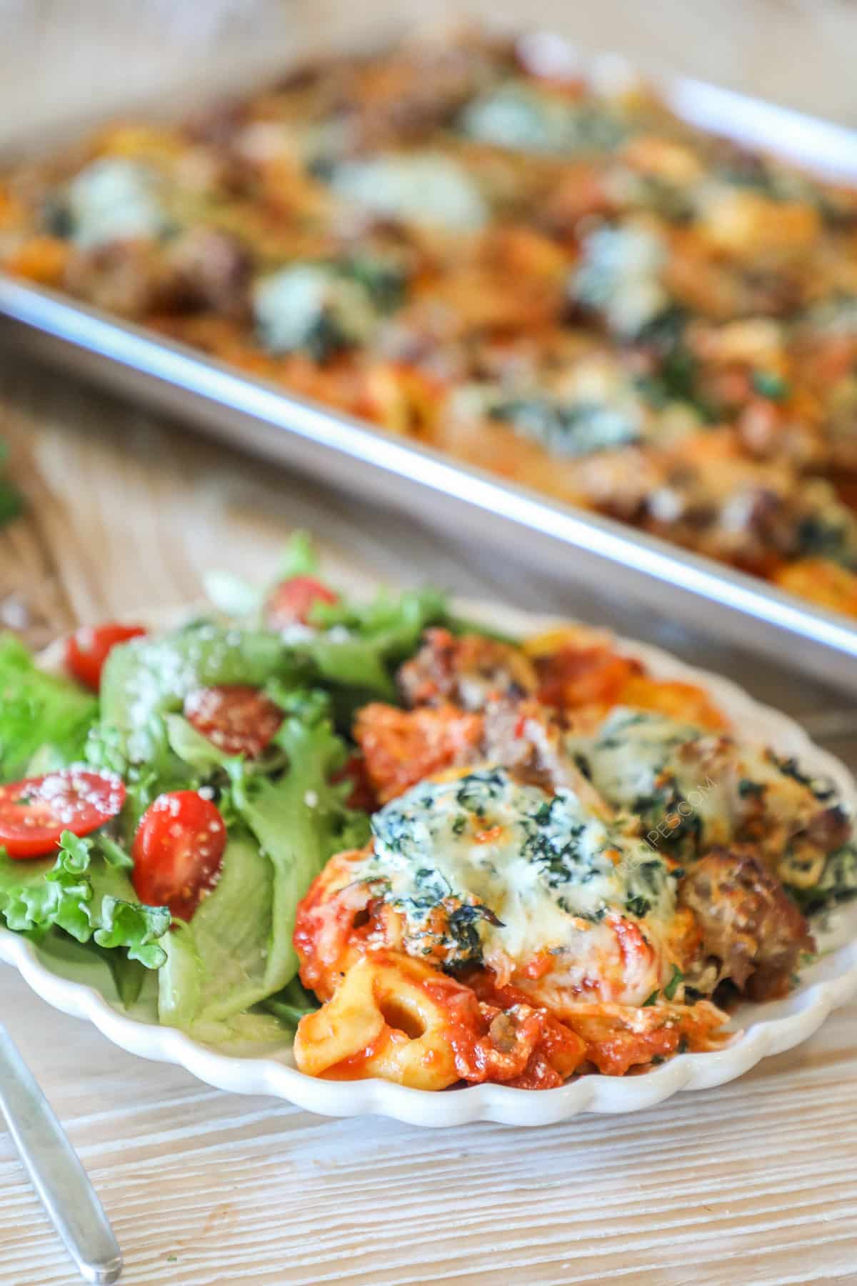 Place served with cheesy sausage tortellini and a side salad.