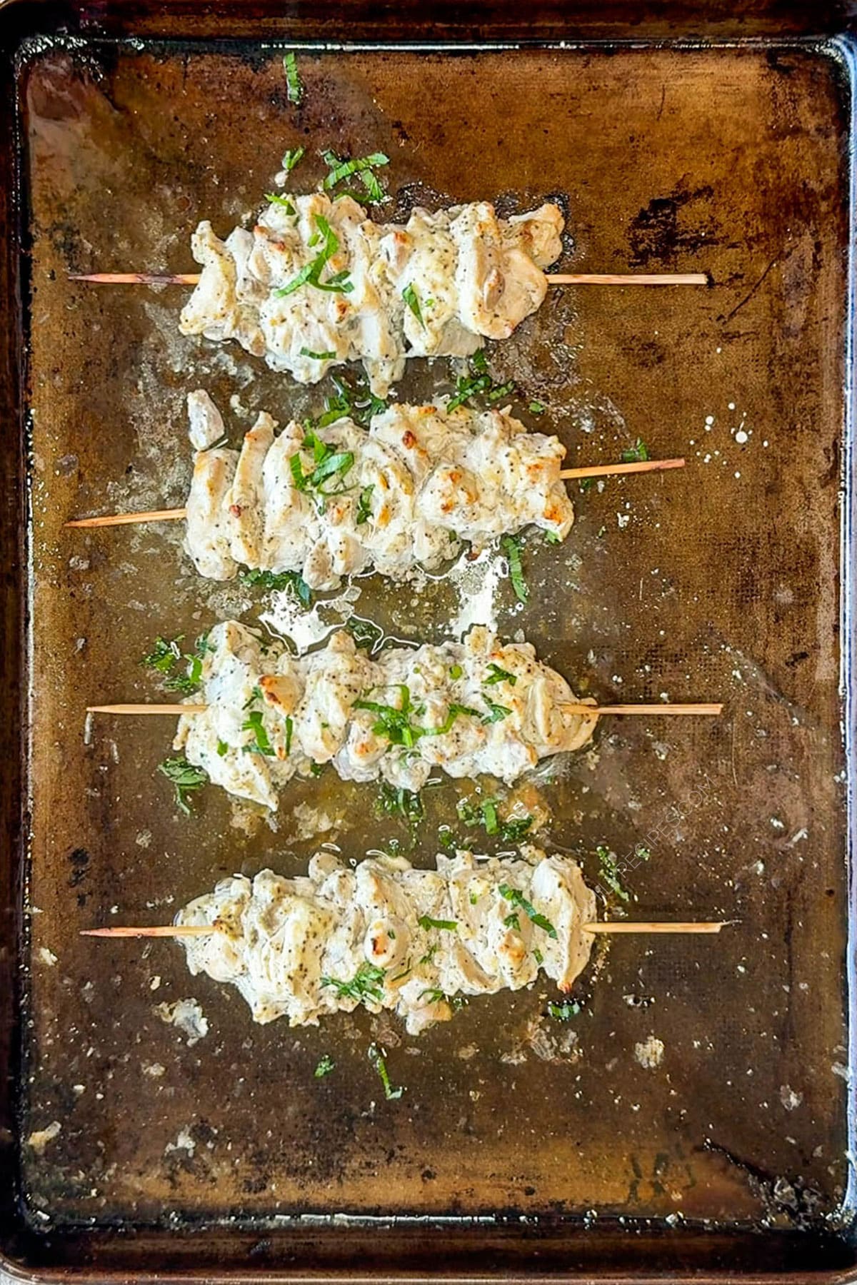 greek chicken gyro skewers on sheet pan