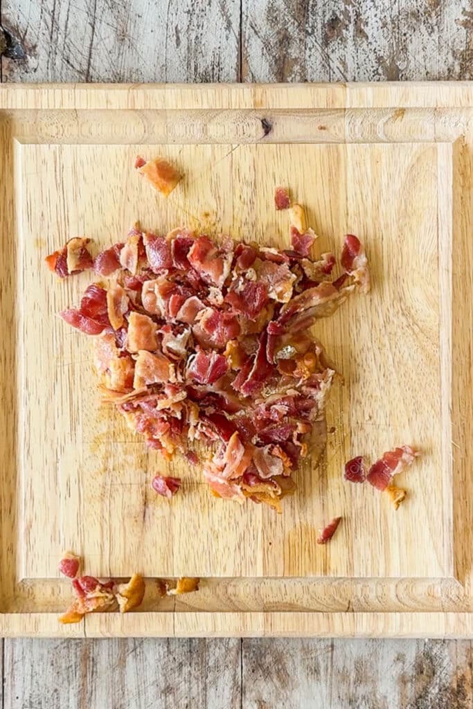 bacon bits on a cutting board.