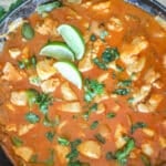 Overhead shot of one pan chicken curry in a skillet.