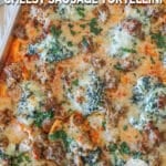 Overhead shot of the corner of the sheet pan of cheesy sausage tortellini.