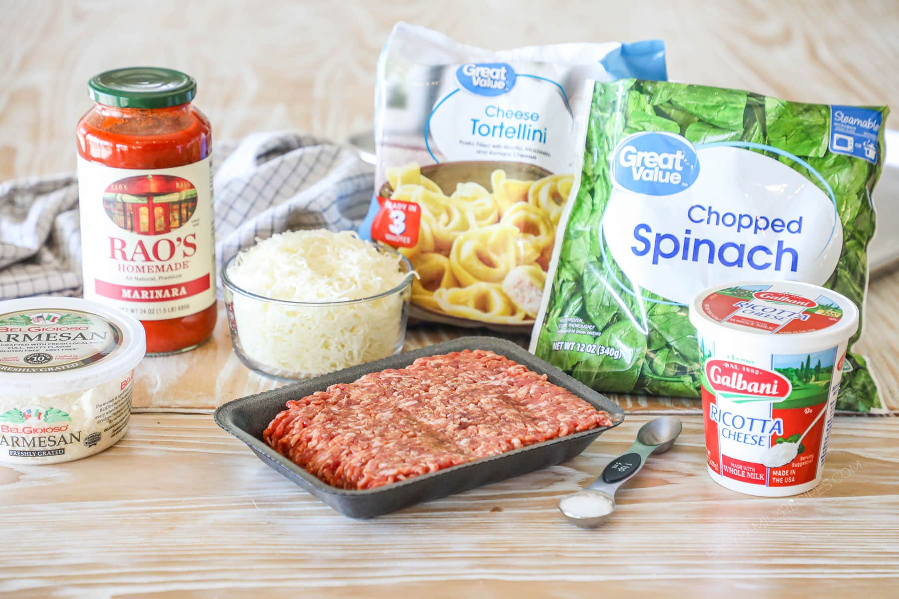 Ingredients needed to make sheet pan cheesy sausage tortellini.