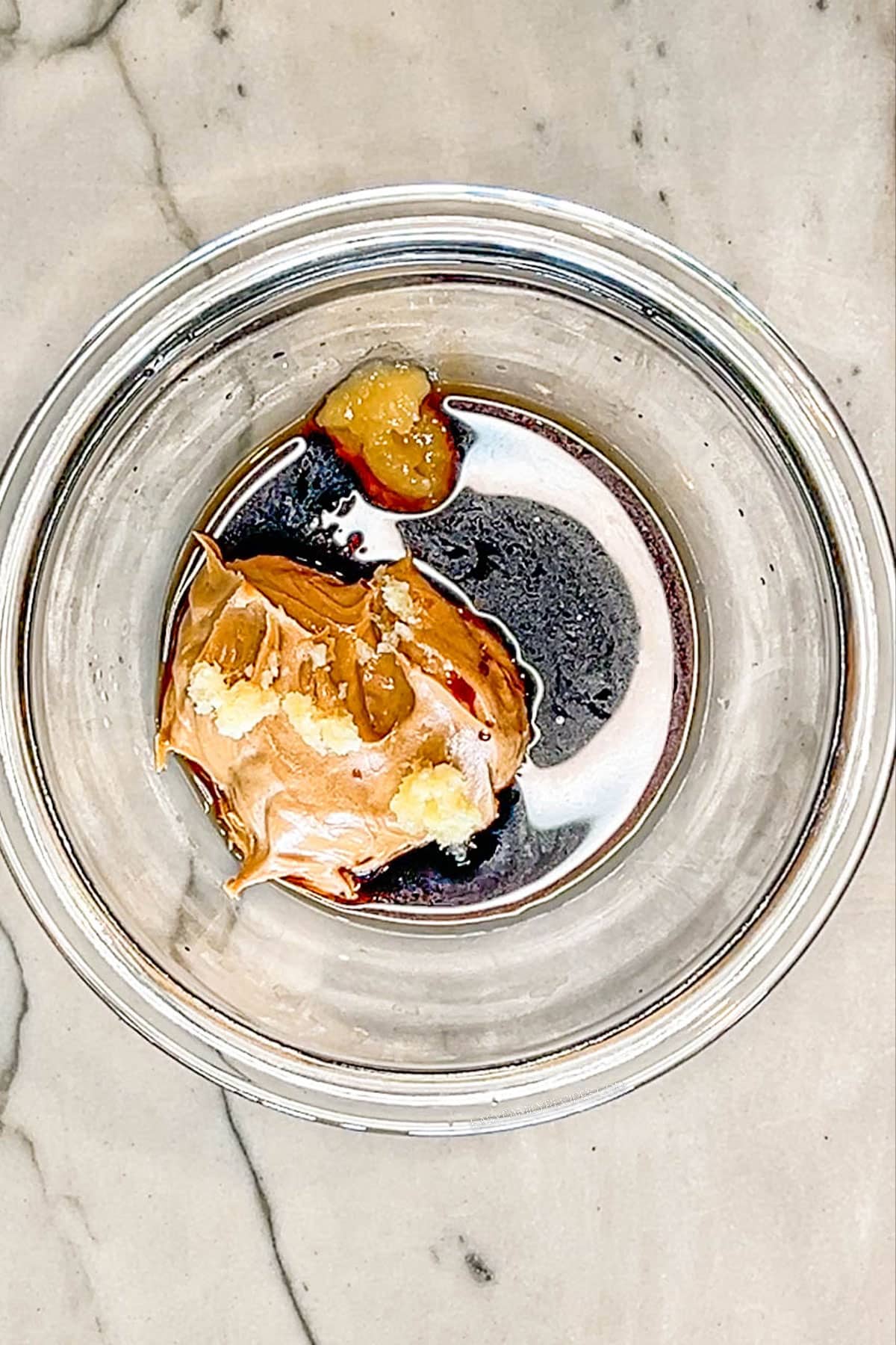 Peanut dressing- add peanut butter, soy sauce, rice vinegar, sesame oil, sriracha, garlic, ginger and water