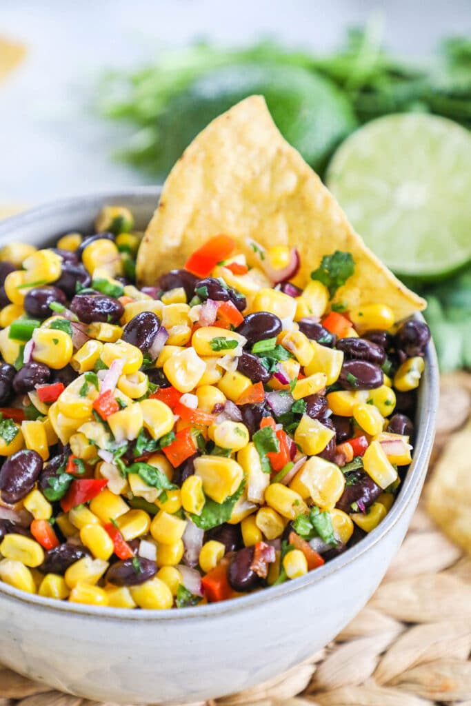 Close up of a bowl of corn and black bean salsa