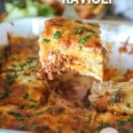 Million dollar ravioli on a spatula hovering over the baking dish.