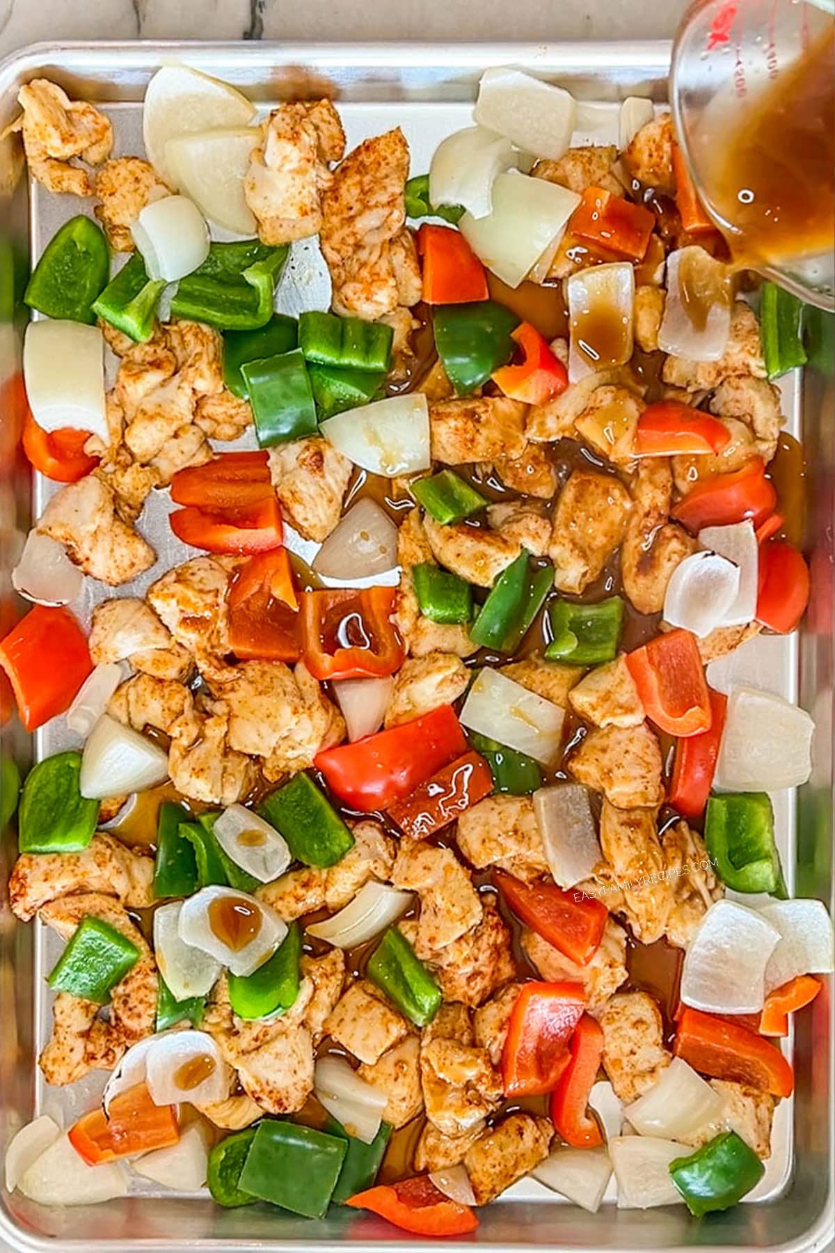 Pan of sheet pan orange chicken