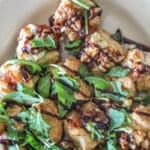 Goat Cheese and Fig Jam Puff Pastry Bites on white platter