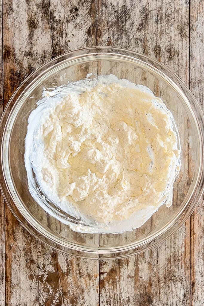 cream cheese sauce ingredients in a mixing bowl.