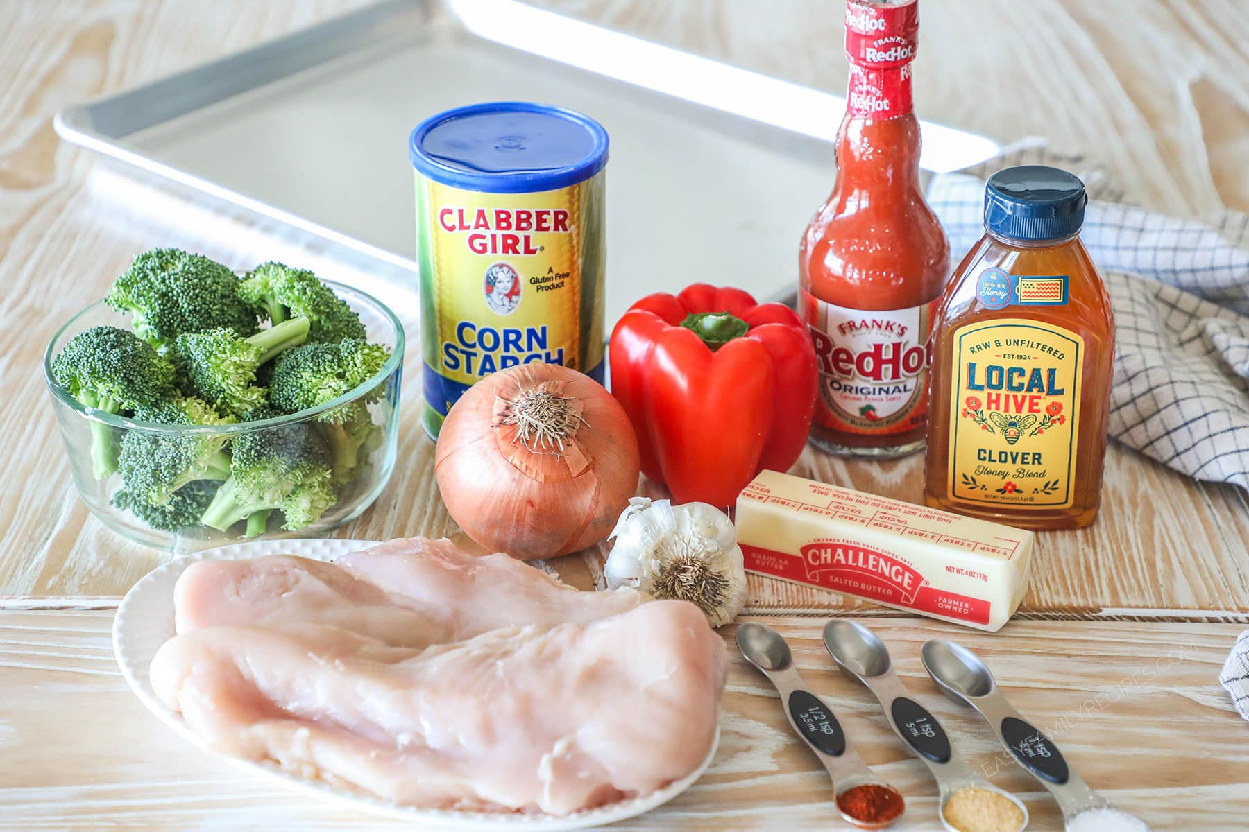 Ingredients needed to make sheet pan hot honey chicken.