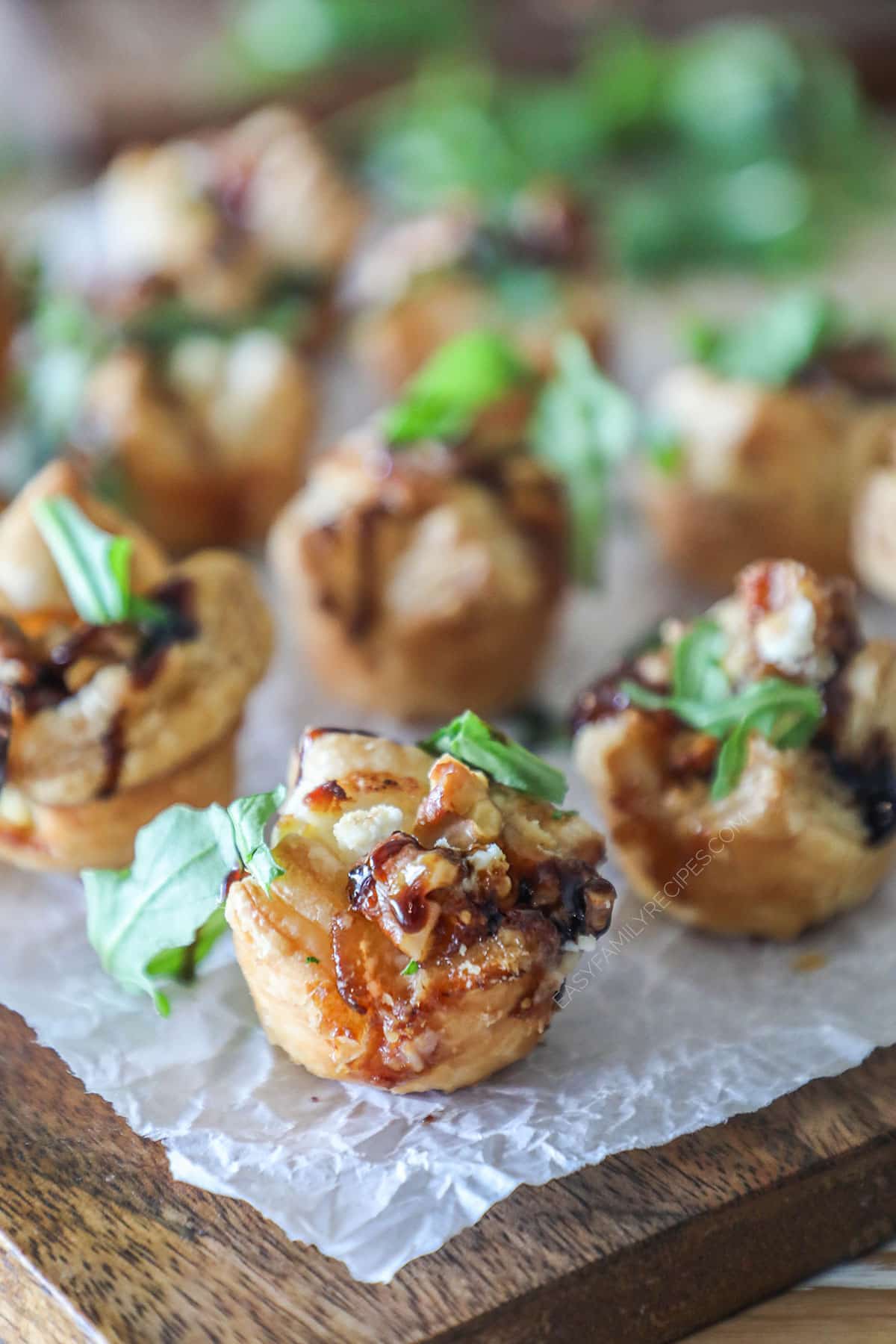 Goat Cheese and Fig Jam Puff Pastry Bites on wooden board