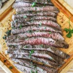 Flank steak cut on wooden board