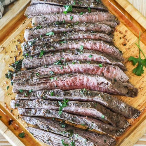 Flank steak cut on wooden board