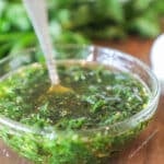 side view of a bowl of the best chimichurri recipe.