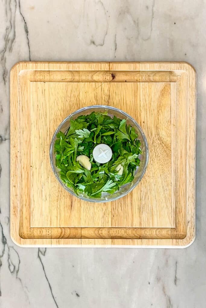 parsley and garlic in a food processor.