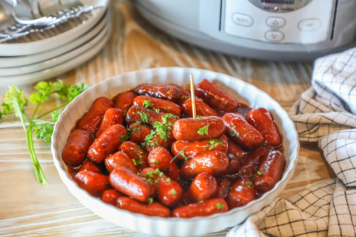a bowl filled with bbq lil smokies.