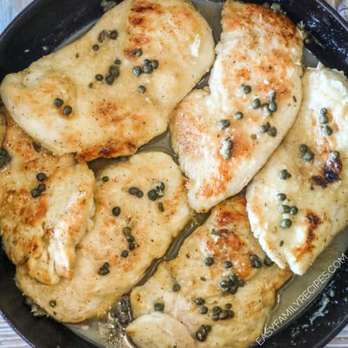 Close up of chicken piccata in a skillet.