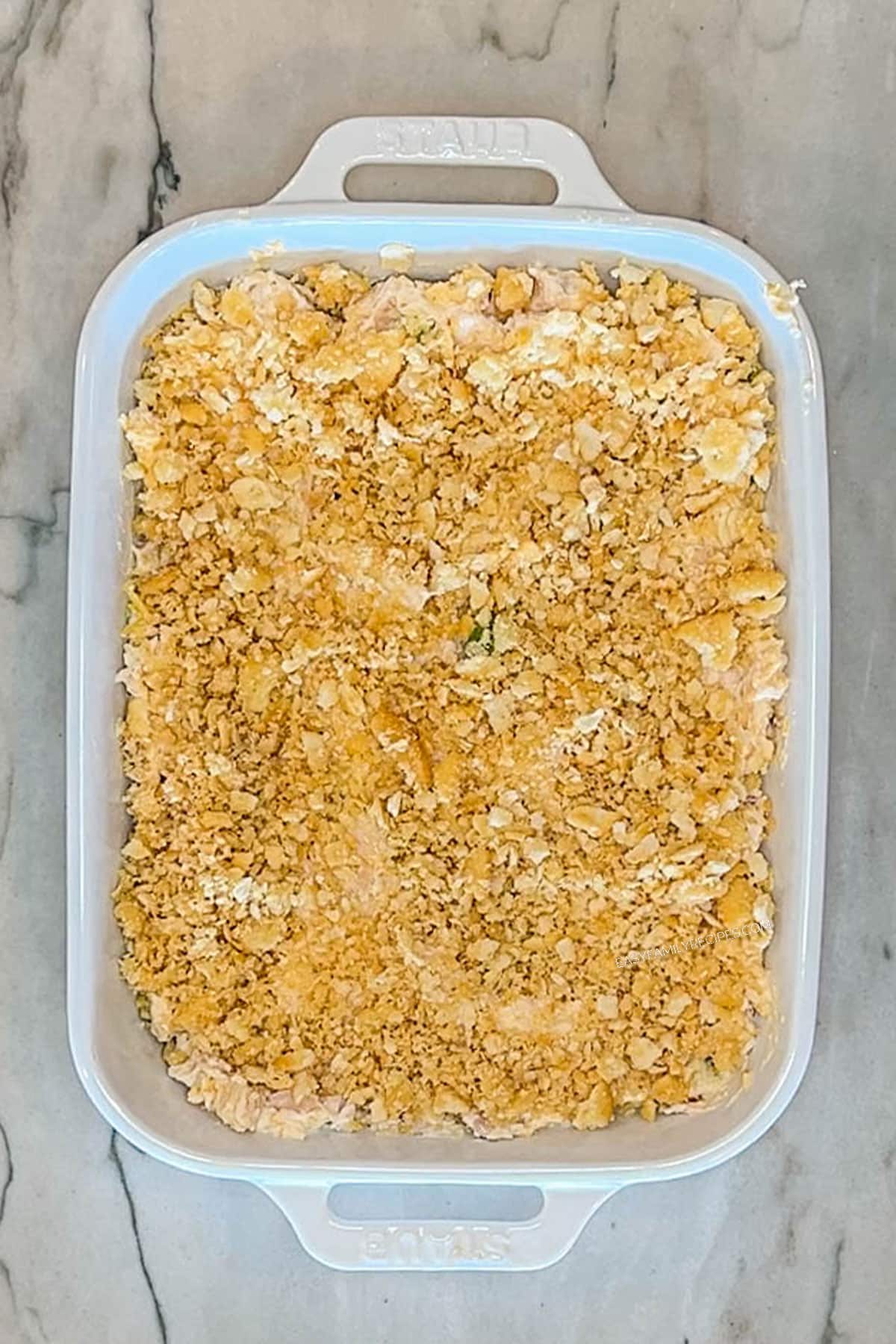 Step 5 for making Neiman Marcus Chicken Casserole- bake until golden crunchy topping
