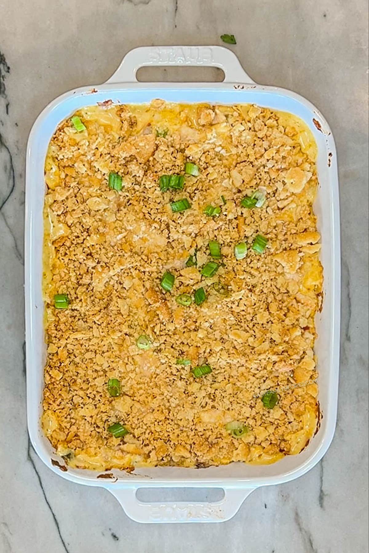 Step 6 for making Neiman Marcus Chicken Casserole- top with sliced green onions